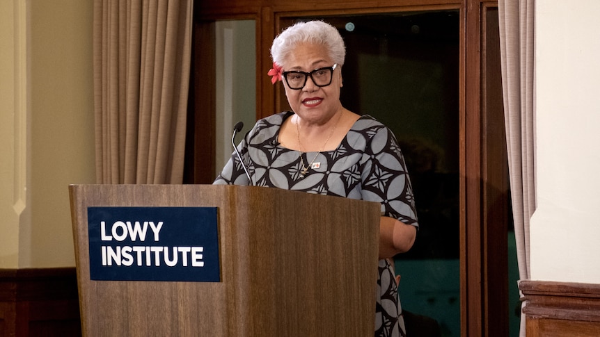 A photo of Samoan Prime minster at the Lowy Institute podium, during her speech.