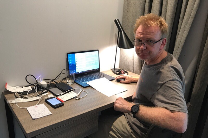 A man sitting at a desk