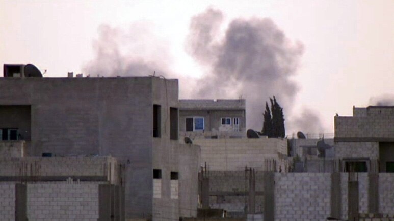 Smoke rises amid fighting in Kobani
