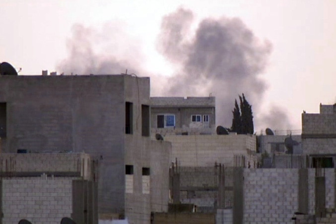 Smoke rises amid fighting in Kobani