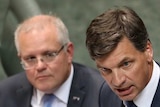 Angus Taylor speaks at the despatch with Scott Morrison looking on behind him