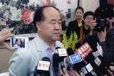 Chinese writer Mo Yan talks to the media in his hometown Gaomi, Shandong province. He won the 2012 Nobel prize for literature.