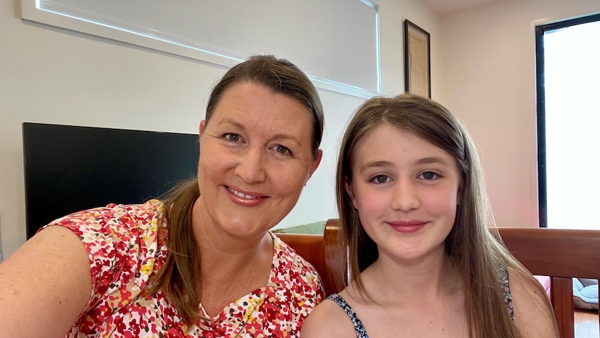 Melanie Stott (left) and her daughter Miranda (right) smiling in a photo