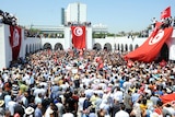 Protests in Tunis at funeral for opposition MP