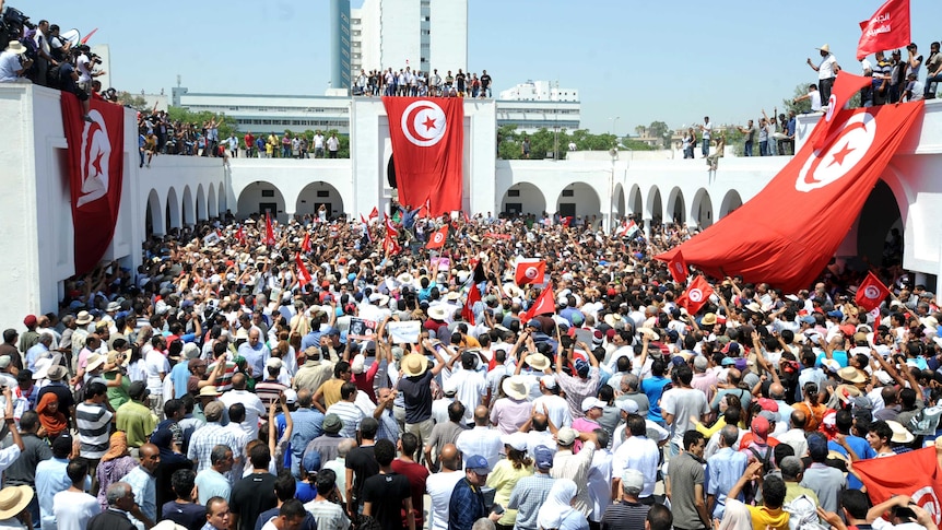 Protests in Tunis at funeral for opposition MP