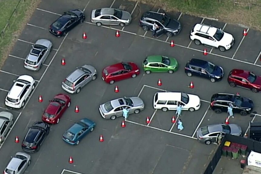 An aerial picture of cars lining up at a COVID testing centre.