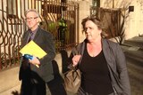 Tony Halczuk leaving court with ACIS lawyer Therese Karpinski