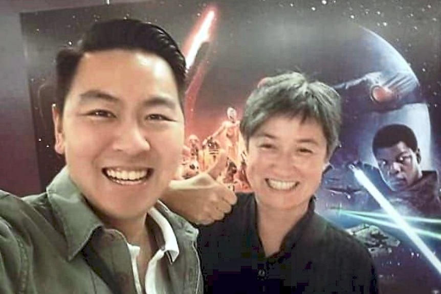 Penny Wong gives the thumbs up in a selfie with her brother