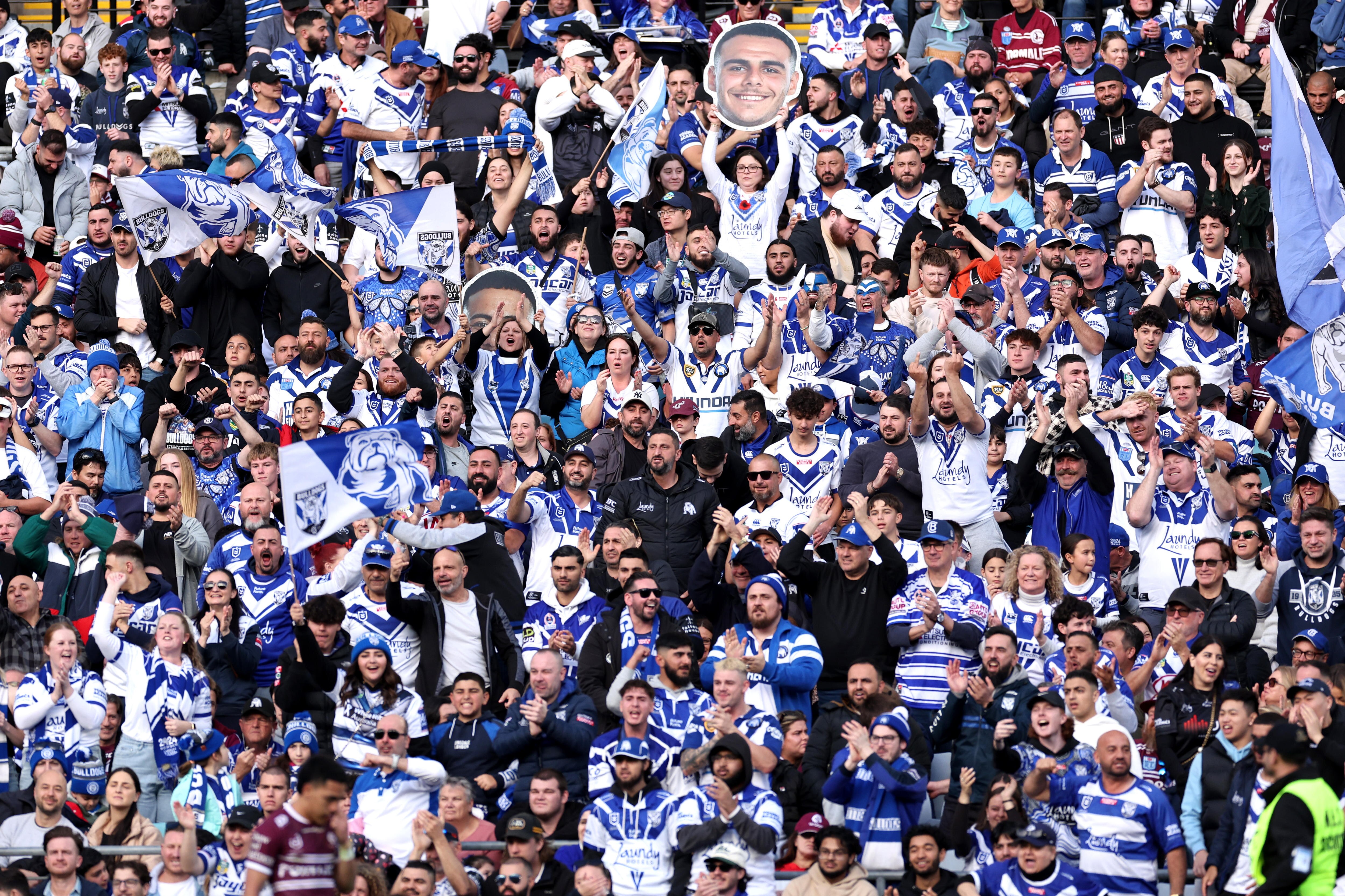 Rugby league fans watch a match