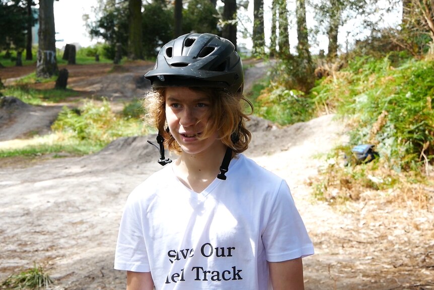 Austin at hell track, wearing save our track tshirt