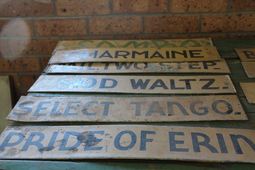 Signs displaying the current dance from Broken Hill's former Palais de Danse amusement park.