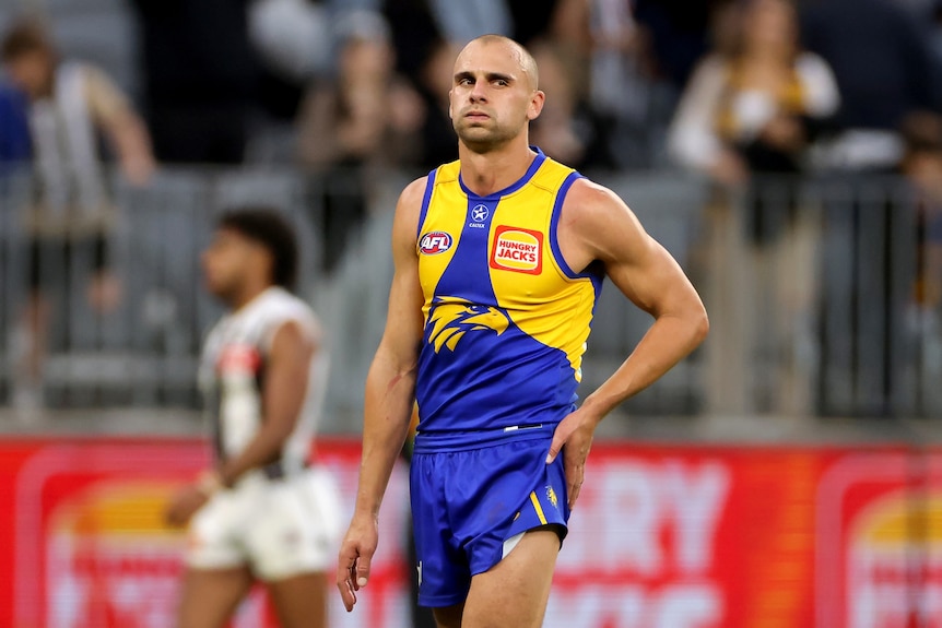 West Coast Eagles players Dom Sheed looks exasperated during a game. 