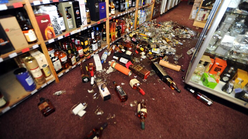 Bottles litter floor of bottle shop after NZ earthquake