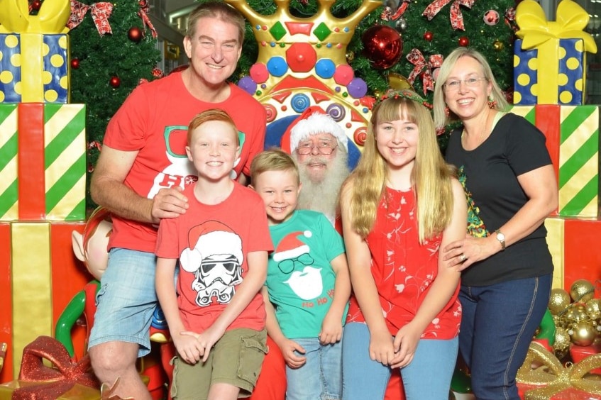 Anna Rogers (right) with her husband and three children.