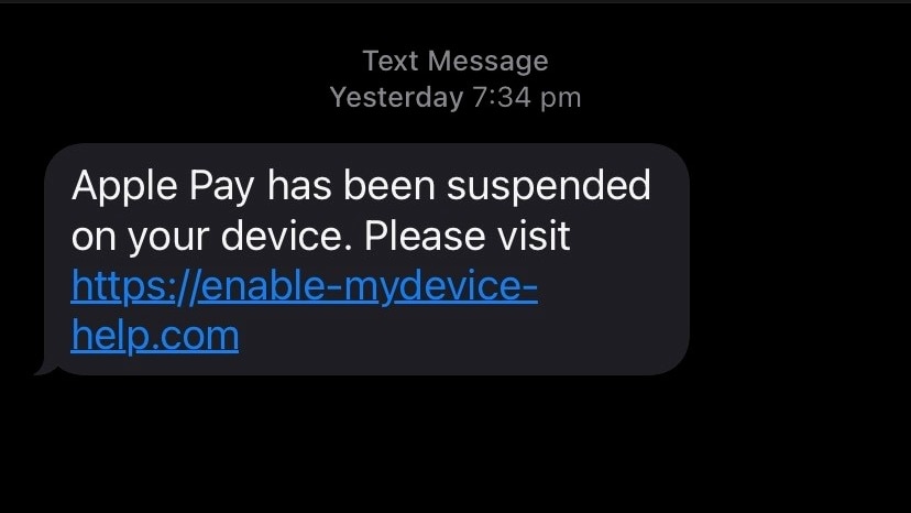 Text message from a scammer reads "Apple Pay has been suspended on your device"