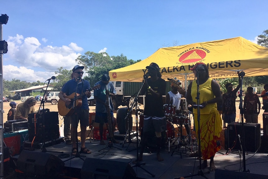 Paul Kelly performs the song 'Treaty' with a reformed Yothu Yindi.