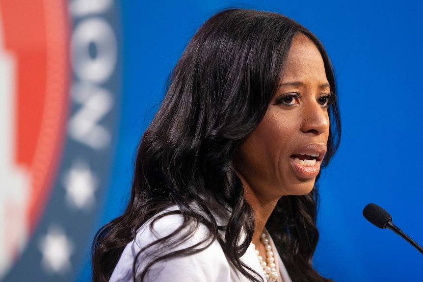 A close up shot of US representative Mia Love talking into a microphone