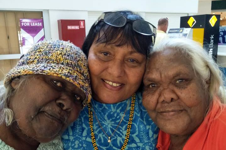 Three women, headshot.