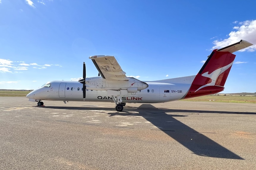 The QantasLink plane on the tarmac at Broken Hill airport.  