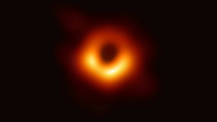 A blurry ring of yellow against the black of space
