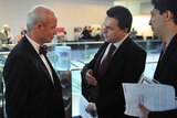 Nick Xenophon and Simon Sheikh speak with Woolworths chairman James Strong