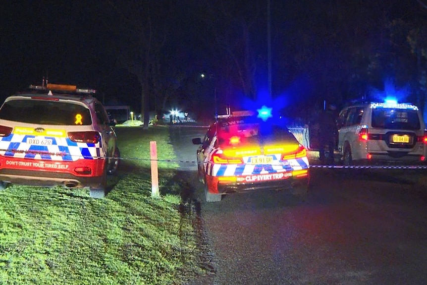 Emergency service vehicles on a road