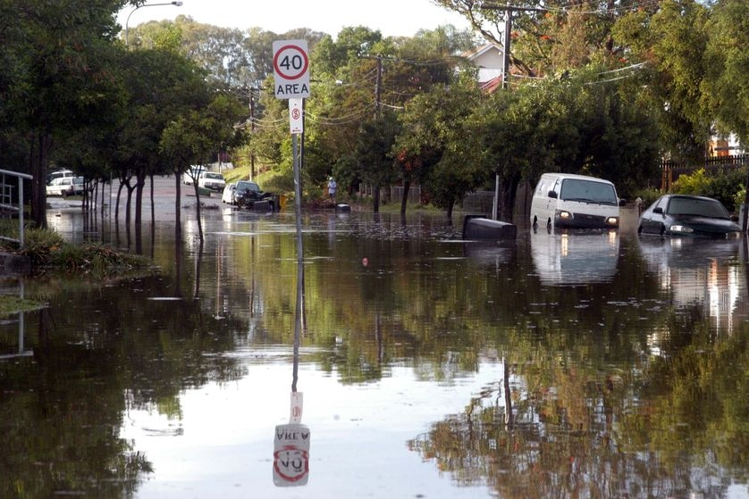 Floodwaters cover an inner-city street in Brisbane.