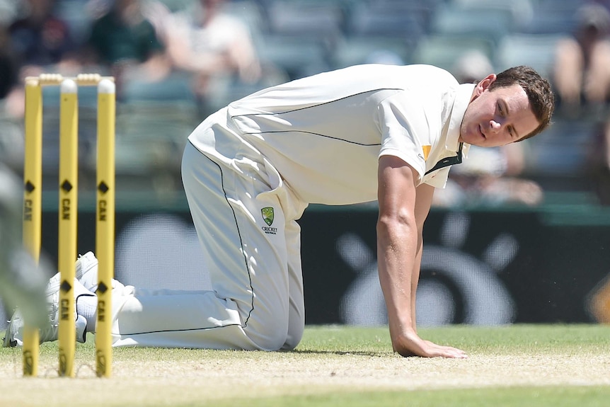 Australia's Josh Hazlewood watches after being hit down the ground in the second Test at the WACA.