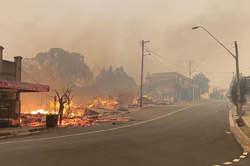 stores burning on a main regional town