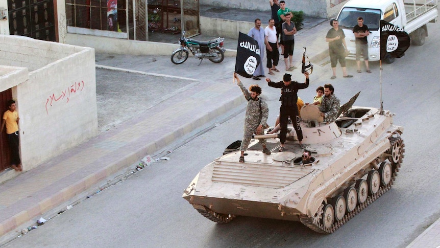Militant Islamist fighters in Raqqa
