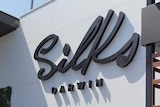 A close shot of the sign for the Silks venue at the Darwin Turf Club.