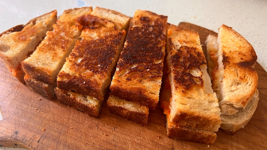 Costa's toastie, cut into thin high-tea-style slices.
