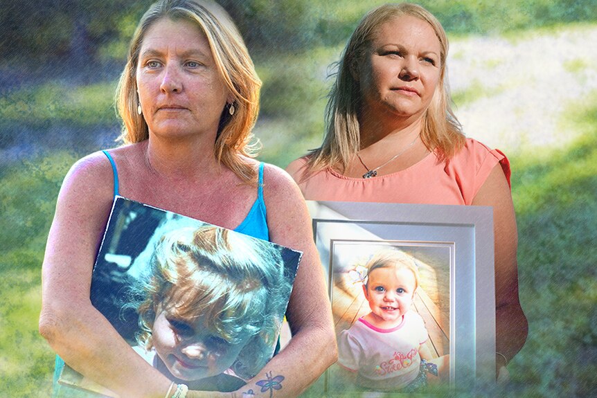 Two women stand outdoors holding framed photos of their daughters