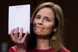 U.S. Supreme Court nominee Judge Amy Coney Barrett displays her blank notepad