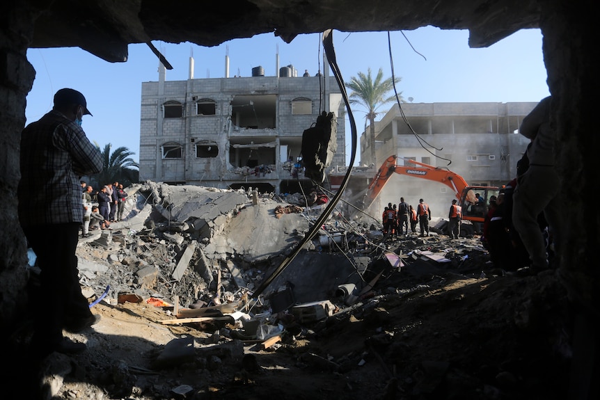 Palestinians search for survivors after the Israeli bombardment of the Gaza Strip.