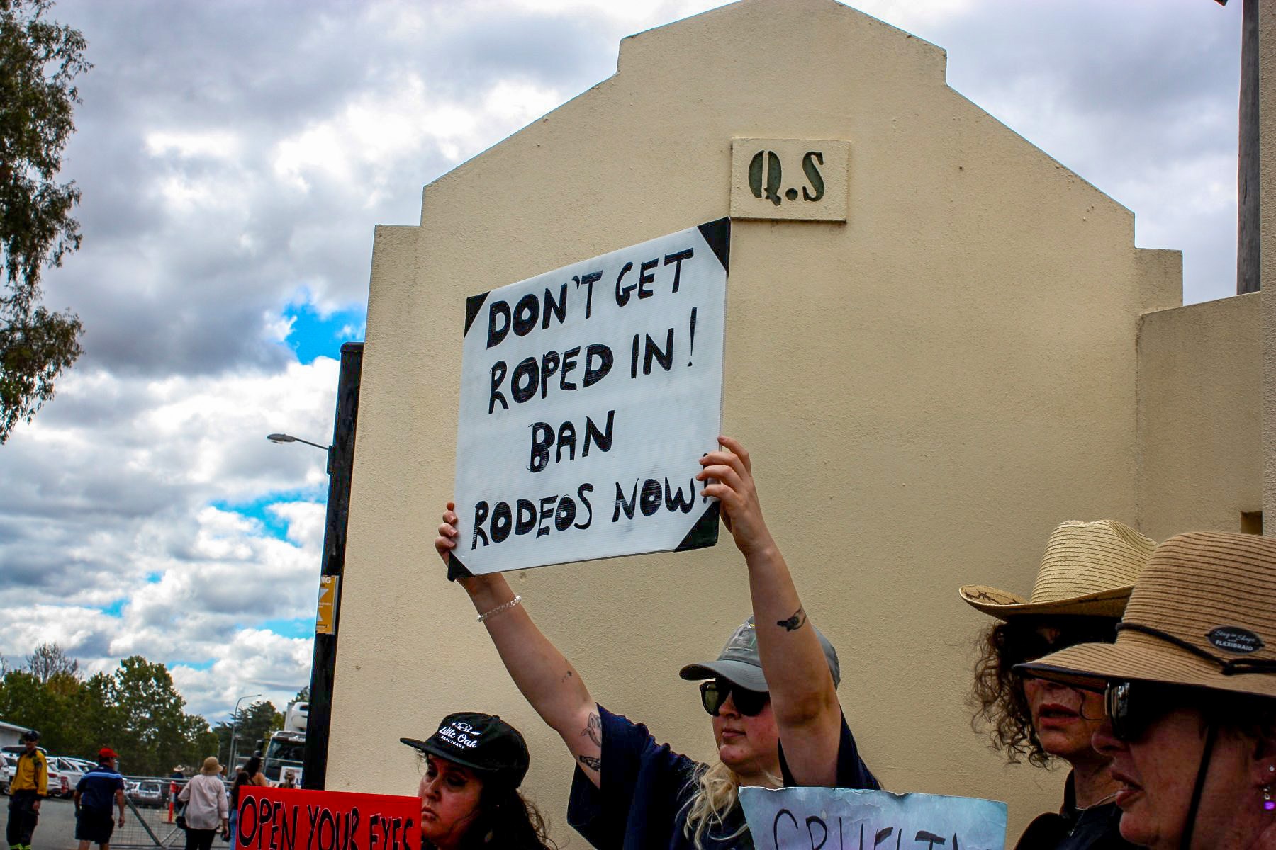A protester holding a sign 