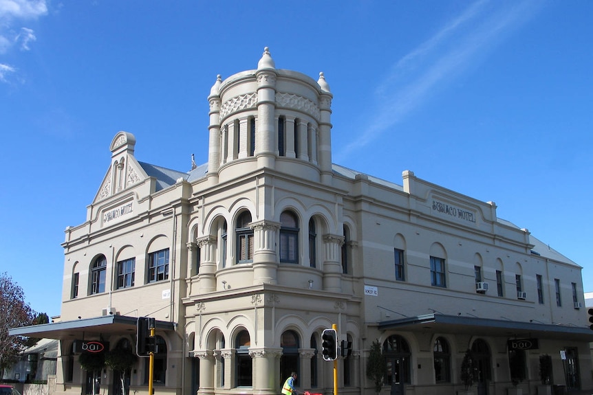 A wide shot of the fron of the Subiaco Hotel.