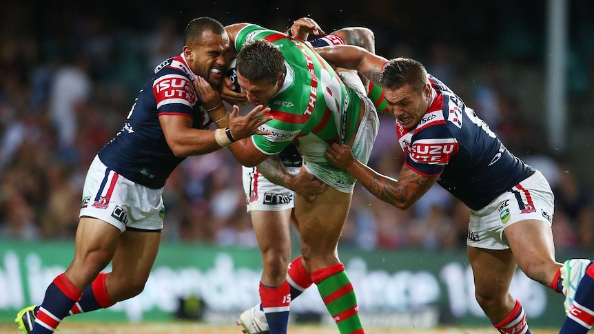 Sam Burgess (C) has received a grade-one charge for a shoulder barge on Mitchell Pearce.