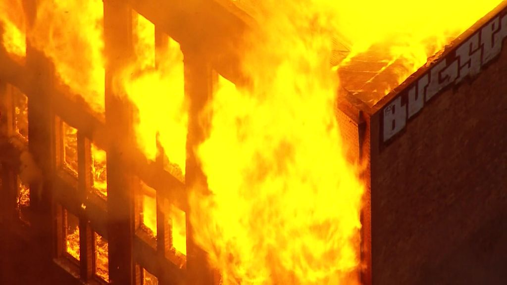 Chaos in central Sydney as massive fire engulfs building and