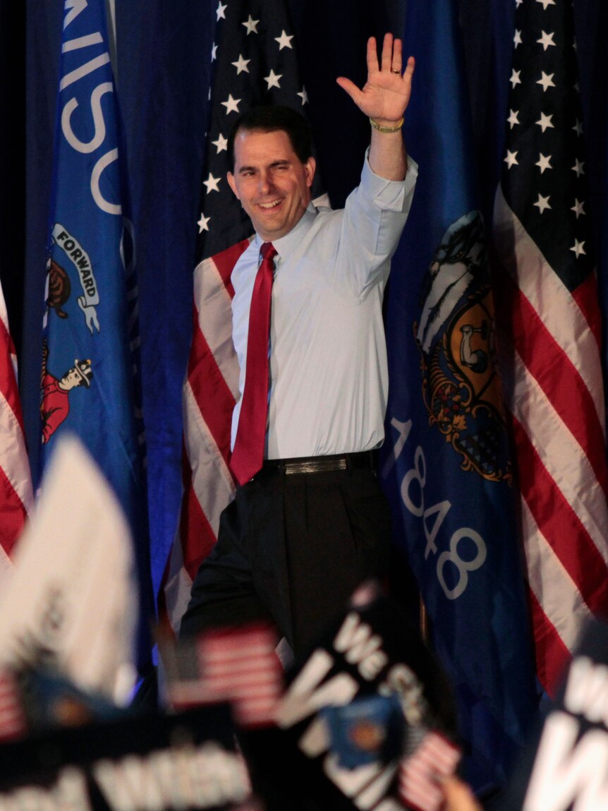 Republican Governor Scott Walker celebrates victory in the recall election against Milwaukee Mayor Tom Barrett.