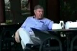 Screenshot from video apparently shows George Pell to the left sitting across from a man
