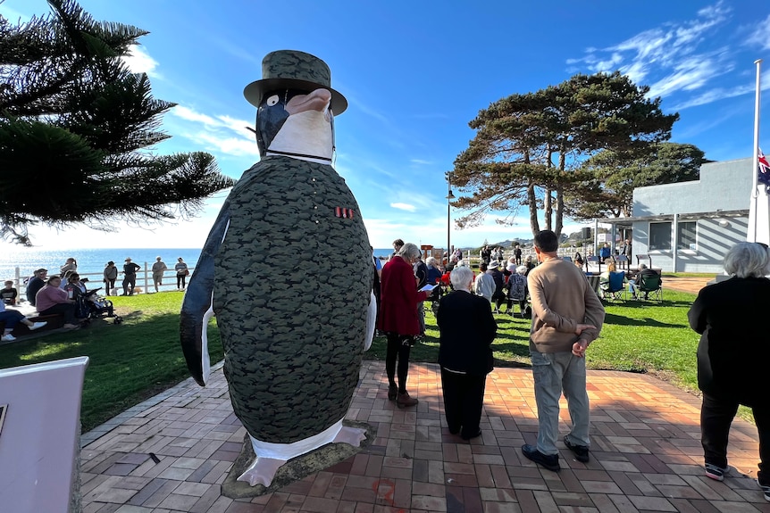 A giant penguin dressed in an army uniform