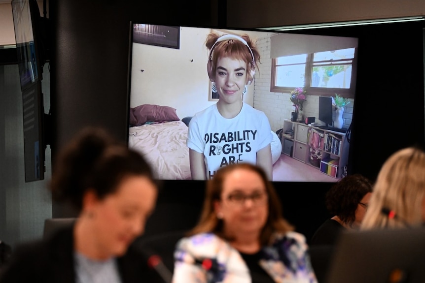 Chloé Hayden up on a screen at the disability royal commission