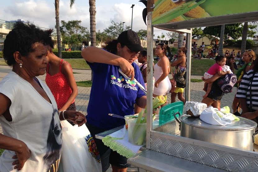 Roseneide Maria de Oliveira sells corn at Madureira Park.