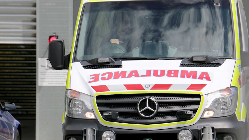 An ambulance vehicle outside a hospital