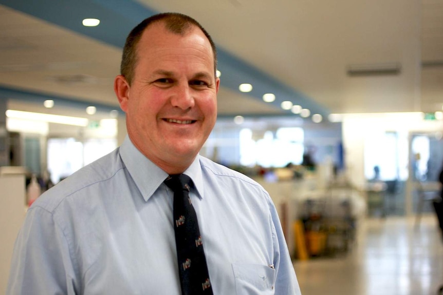 Professor Ian Seppelt in a hospital corridor