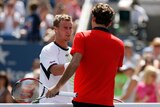 Hewitt (l) expects a tough time regardless of Roger Federer's short US Open turnaround.