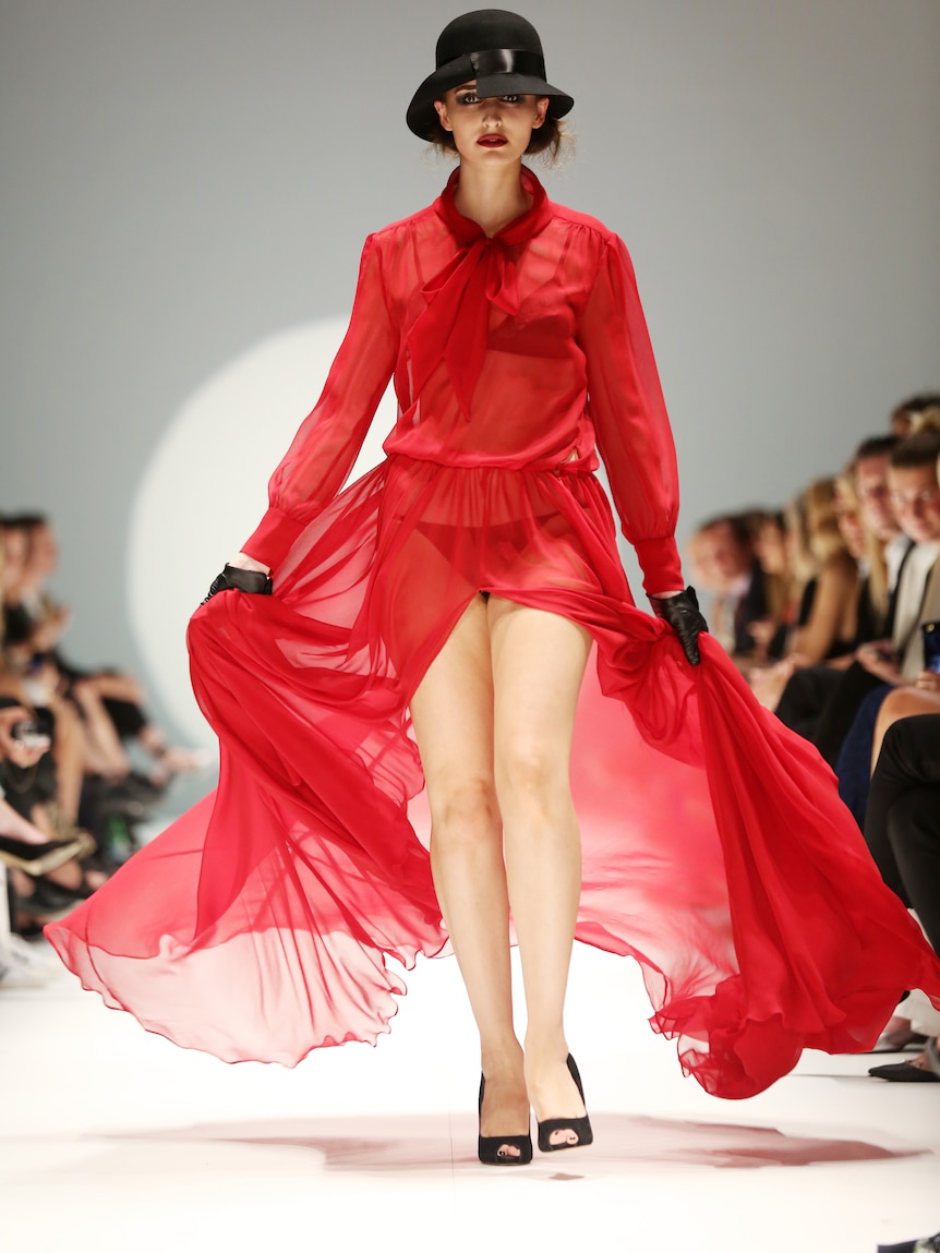 A model walks the runway at Sydney Fashion Week in a Johanna Johnson dress.