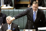 Tension: Peter Costello has denied pledging to destroy the leadership of John Howard