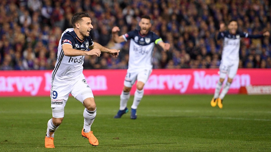 Kosta Barbarouses celebrates his goal for Victory in the A-League grand final.